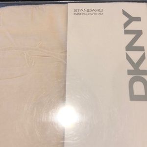 Two DKNY “PURE” Ivory Pillow Shams